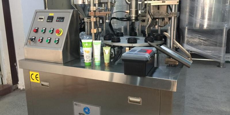 Semi automatic laminated tube filling and sealing machine